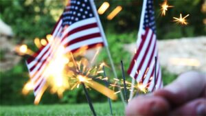 American flags and sparklers outdoors